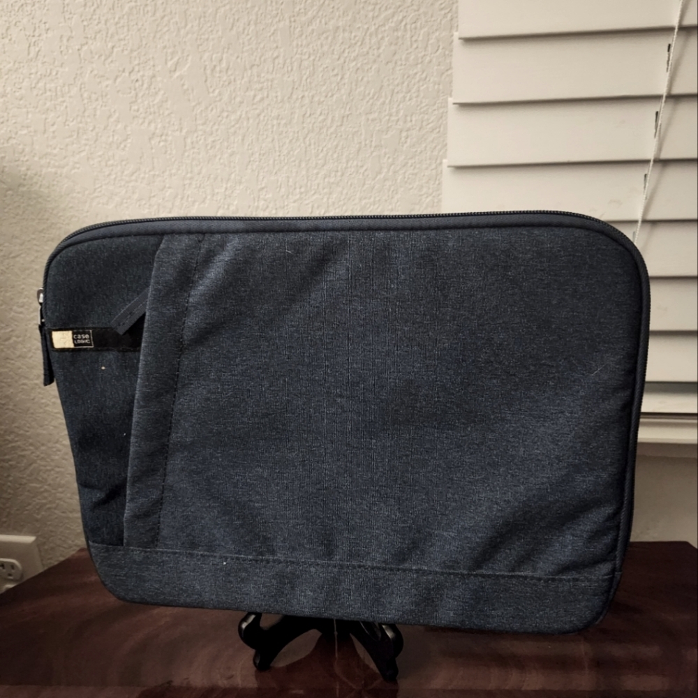 Case Logic brand laptop sleeve, dark blue color